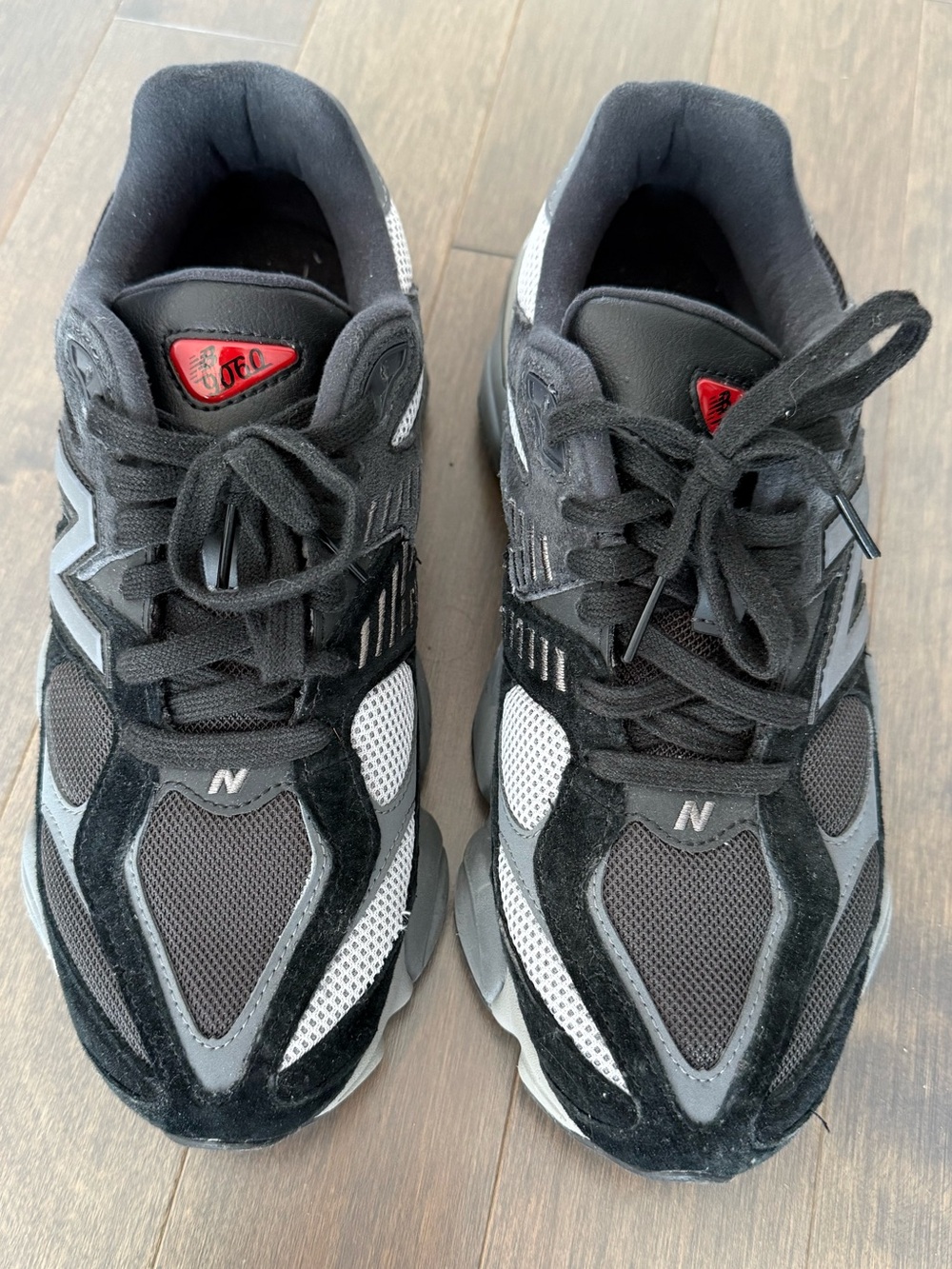 New Balance 9060 Black and Gray Athletic Sneakers with Red Tongue Accent